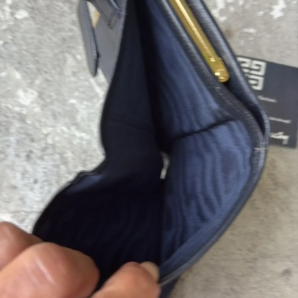 Givenchy blue velvet French kiss closure wallet